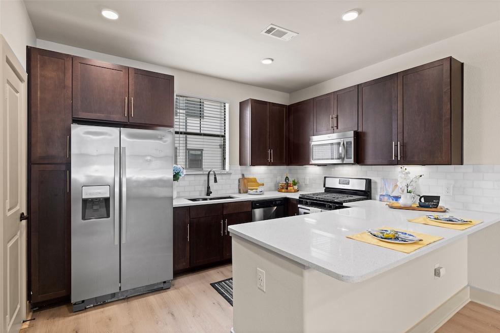 Welcome to this luxurious townhome located in the