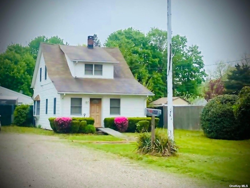 Charming Home with Mid-Block Location on Rare 1/2 