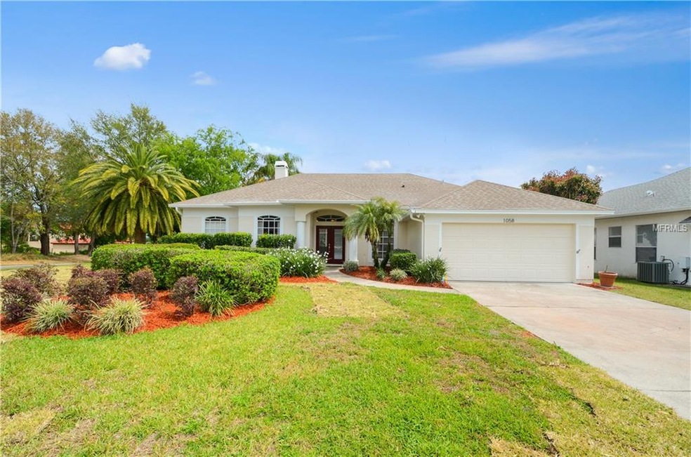 1058 Palm Cove Dr, Orlando, FL 32835 - photo 1