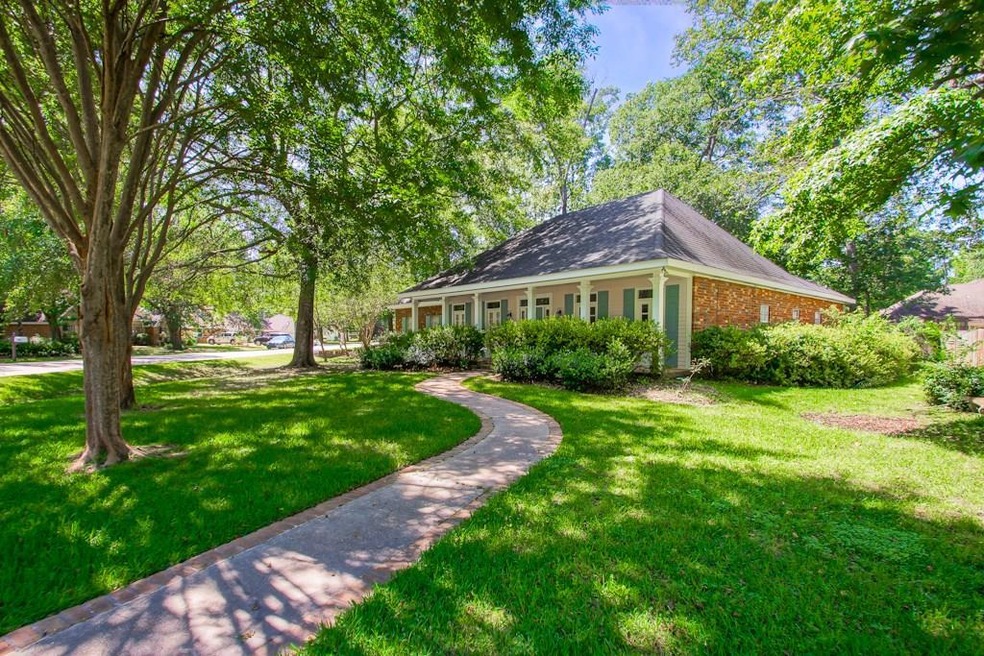 Side view of home with concrete walk-way.