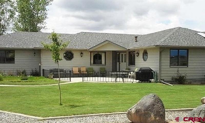 front from driveway and parking area