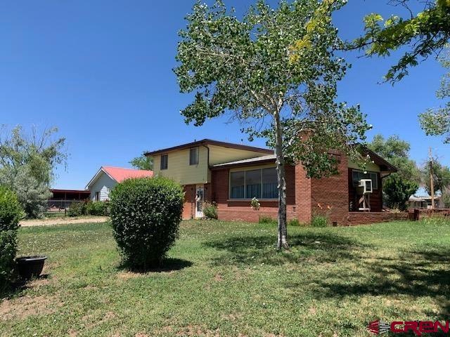 434 W 3rd St, Cortez, CO 81321 - photo 1