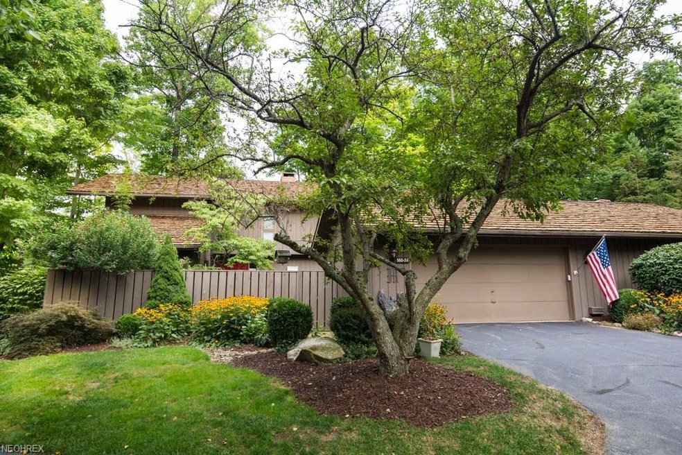 Exterior facing the front of the house and golf co