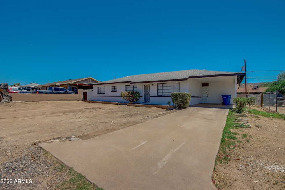 FRONT WITH HUGE YARD