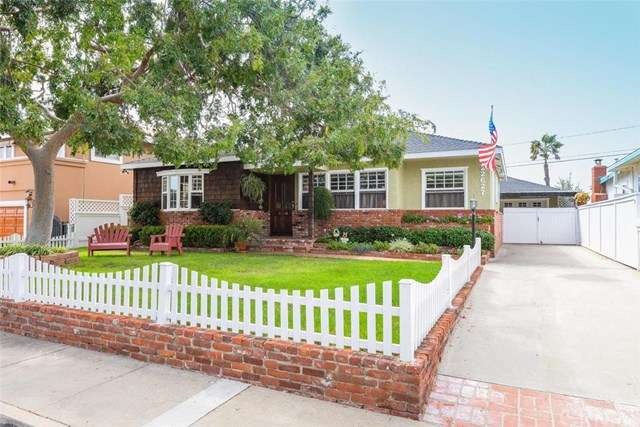 Beautifully landscaped front yard with Chinese Elm