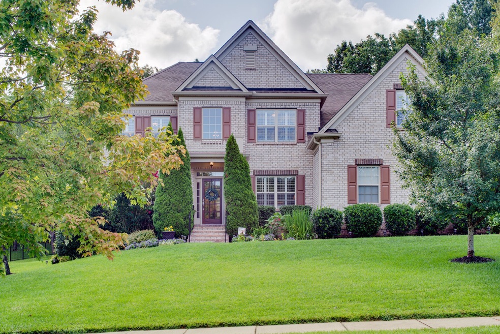 Covered front porch, well maintained all brick home on flat private lot in a well sought after neighborhood with neighborhood side walks and just six houses from community pool.  