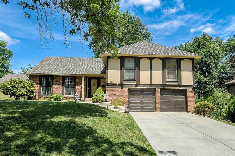 A+ Curb Appeal on a tree-lined street.