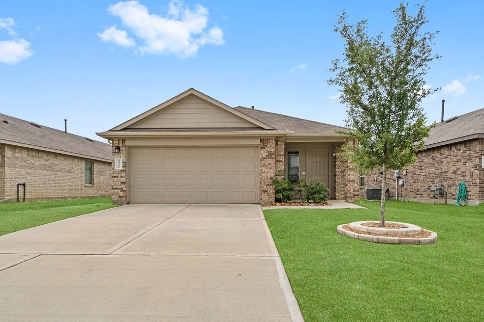 Welcome Home! This charming single-story home is located in Granger Pines community.