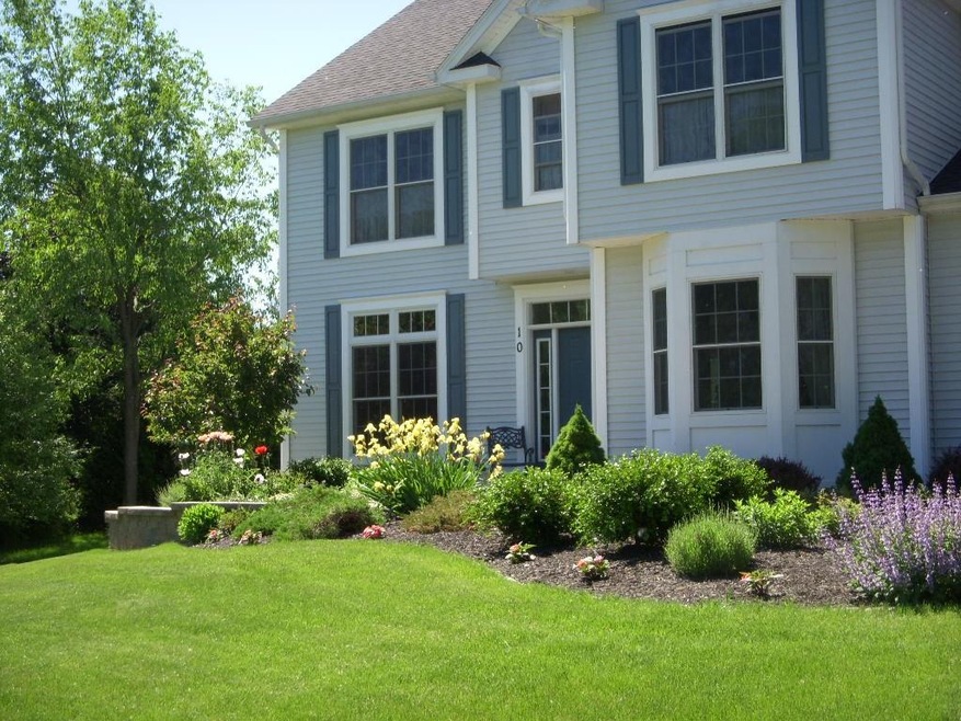 The well landscaped front entry will welcome your 