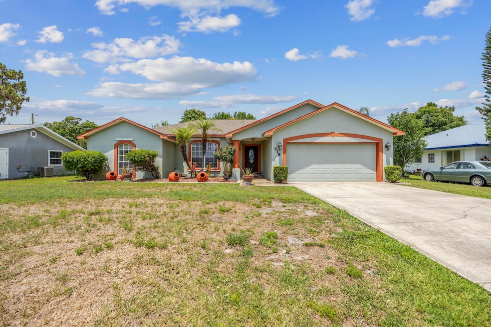 418 Beauregard Ave NE, Palm Bay, FL 32907 - photo 1