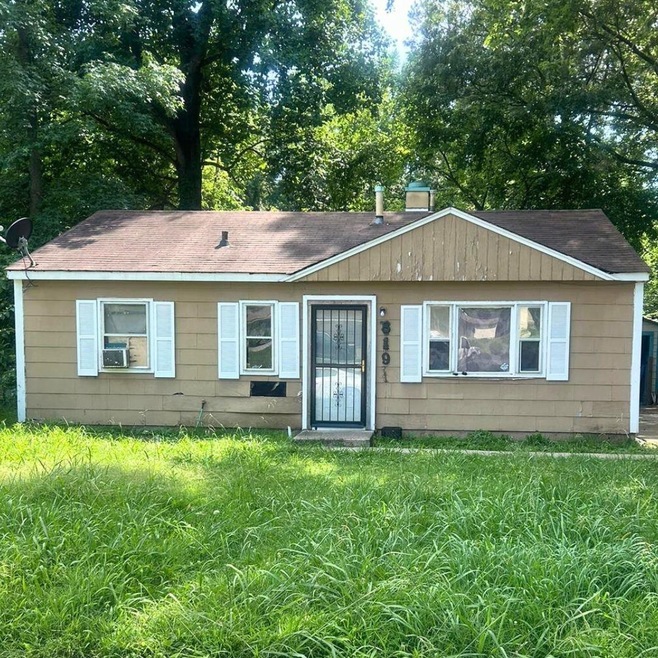 View of front of property with cooling unit and a 