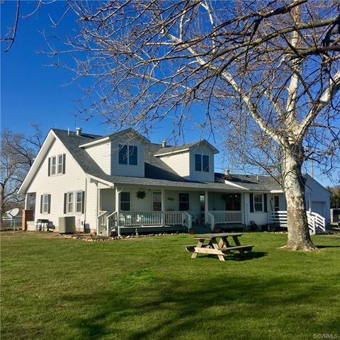 Back elevation of house with country porch, 2 car 