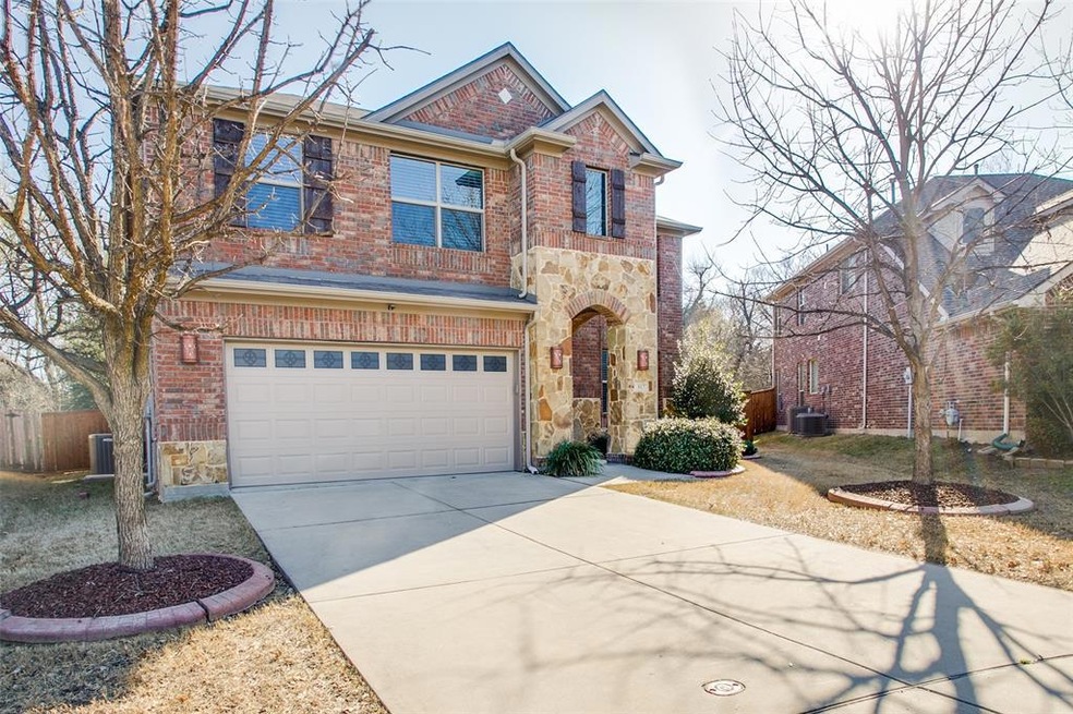Twin trees welcome you to this lovely, smart home 