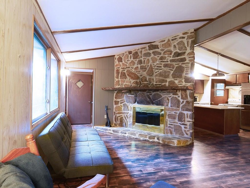 Family room with floor to ceiling fireplace