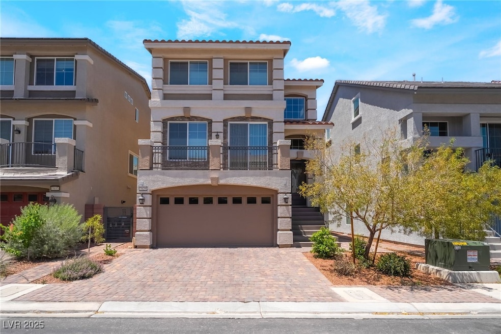 View of front of property with stucco siding, stai
