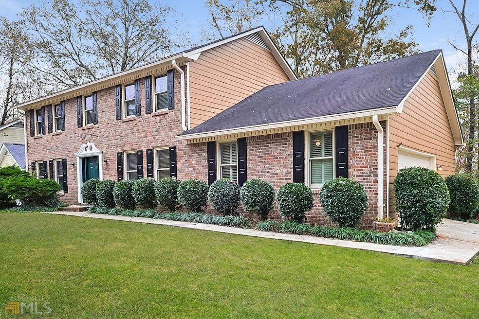 1384 Rustlewood Ct SW, Lilburn, GA 30047 - photo 1