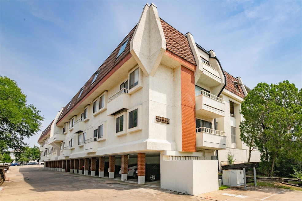 View of apartment building / complex featuring co