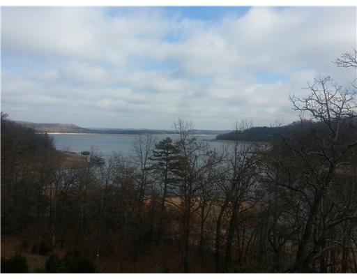 View. Gorgeous three-level, lake front home overlo
