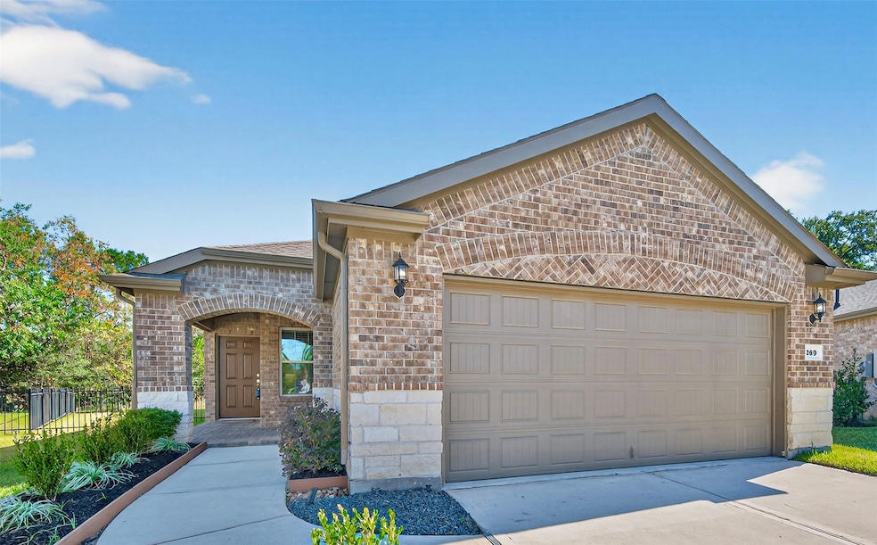 Charming brick and stone home with a two-car garage and a welcoming front porch with pathway to this well-maintained home, leading to a cozy entrance. Highly sought after large lot with no rear neighbors. Full home GENERATOR. Gutters all the way around. Perfect for buyers seeking a modern yet classic exterior.