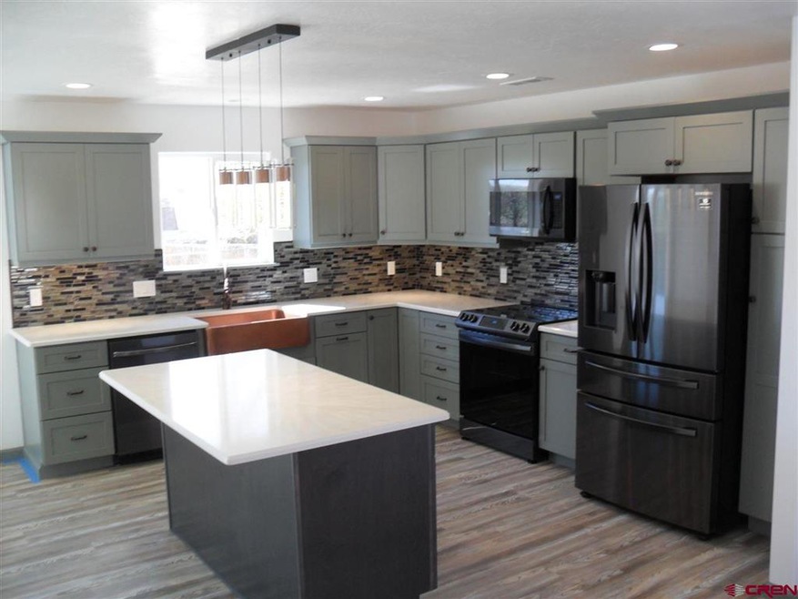 311 N Henry St, Cortez, CO 81321 - photo 1