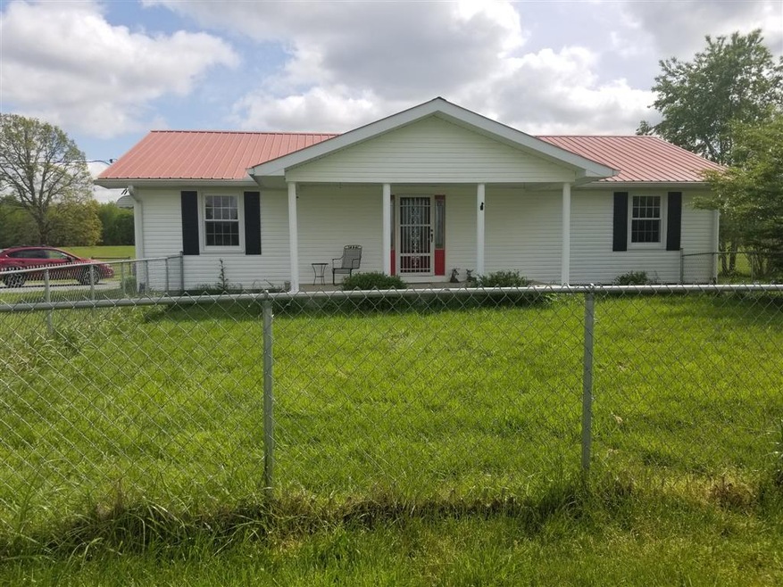 Cozy farm cottage with three bay detached garage a