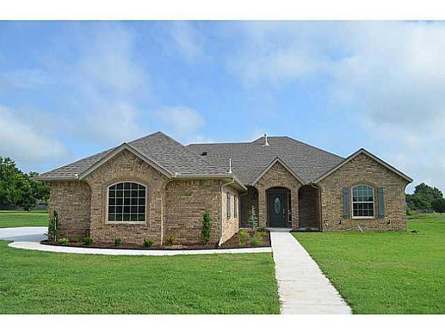 Exterior Front. 1850 sq. ft. on .43 acre in quiet 