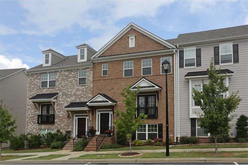 Immaculate townhome in popular Suwanee Station!