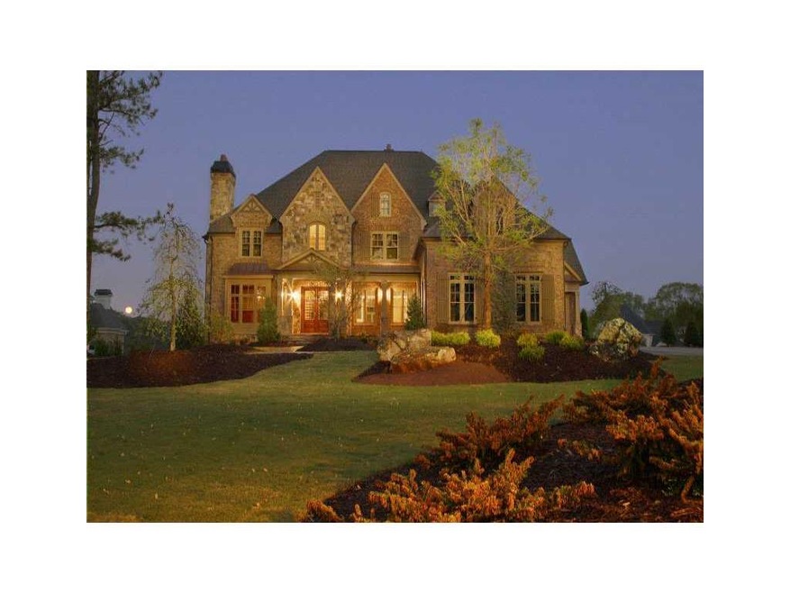 Exterior Front. Twilight photo of this beautiful b
