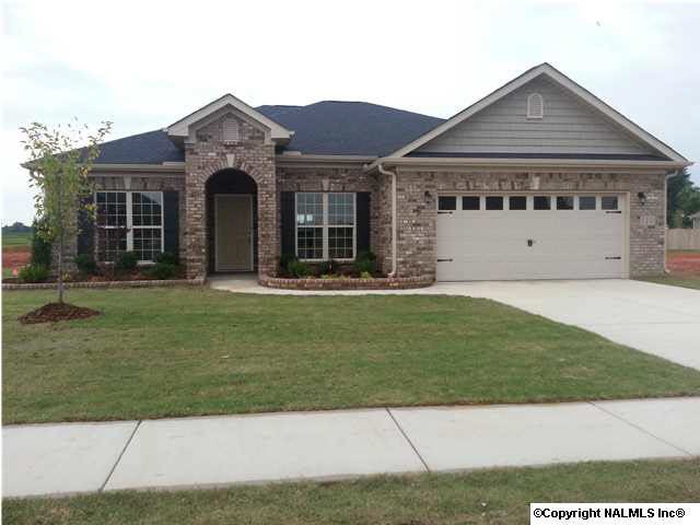 Look at this stately entrance. Formal dining, corner fireplace and great covered patio!!!