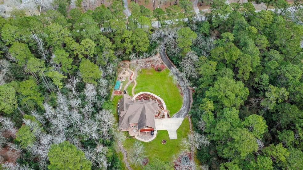 12 W Lake Forest Ct, Conroe, TX 77384 - photo 1