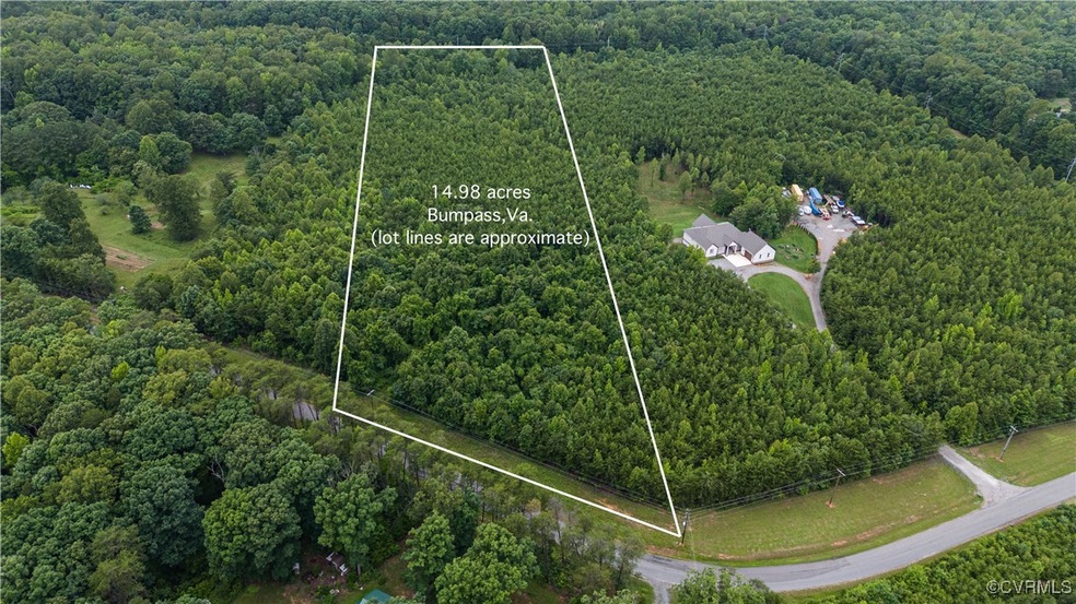 Aerial view of property and surrounding area with