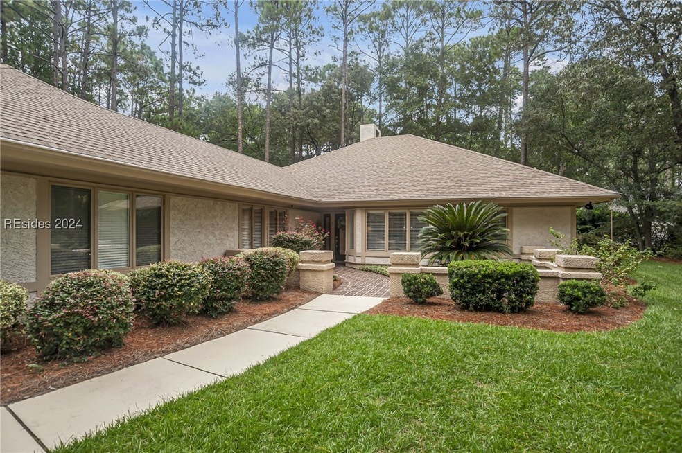 Single story home featuring a front yard