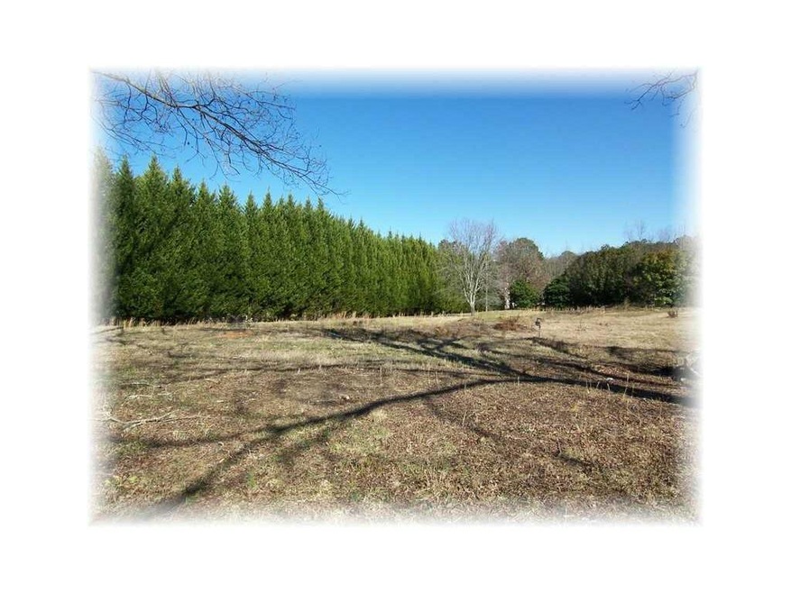 Land/Lot. Level lot in Johns Creek to build your d