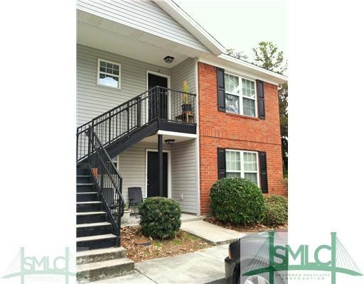 Exterior Front. Upstairs Unit