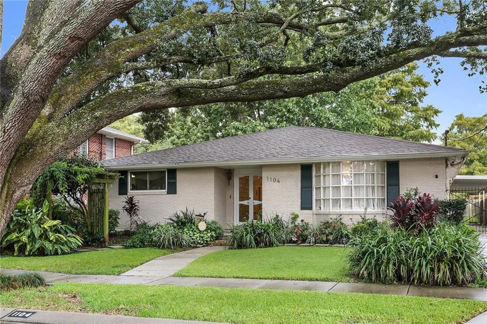 Beautifully landscaped home with mature oak for sh