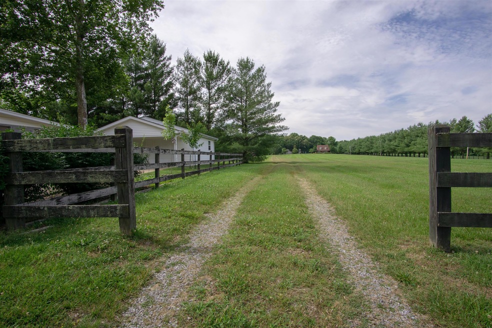 Welcome Home! NO HOA!!  11 +/- Acres. Renovators dream! Bring your designers.
