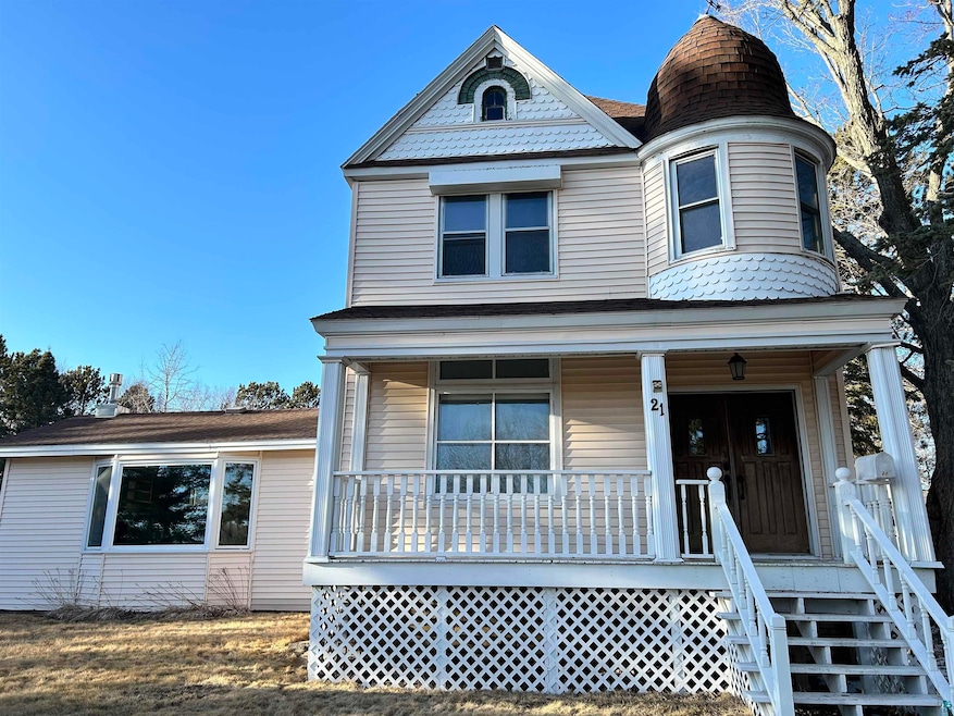 Victorian house featuring a porch