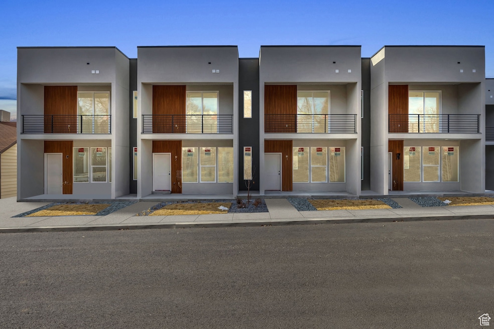 View of front of property featuring stucco siding