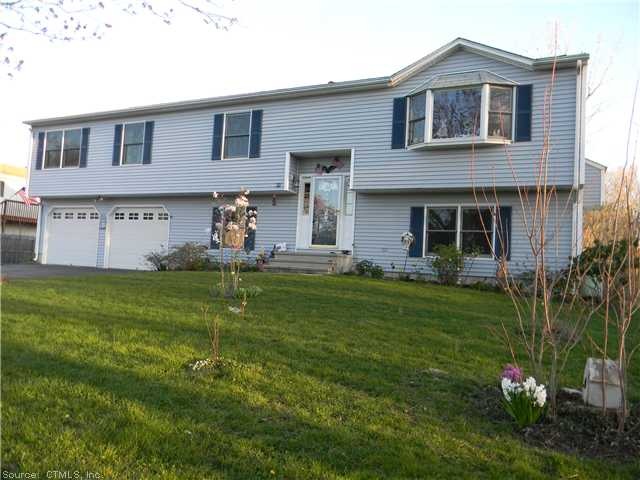 Exterior Front. Oversized Raised Ranch