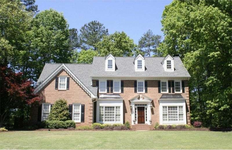 Gorgeous 3-sided brick home with great curb appeal