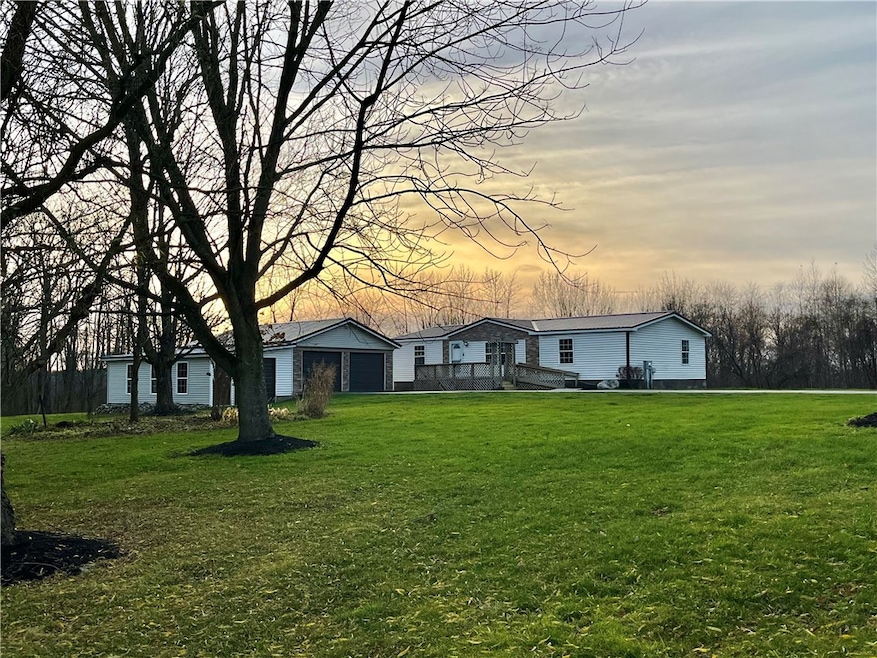 11834 Tellier Rd, Wolcott, NY 14590 - photo 1