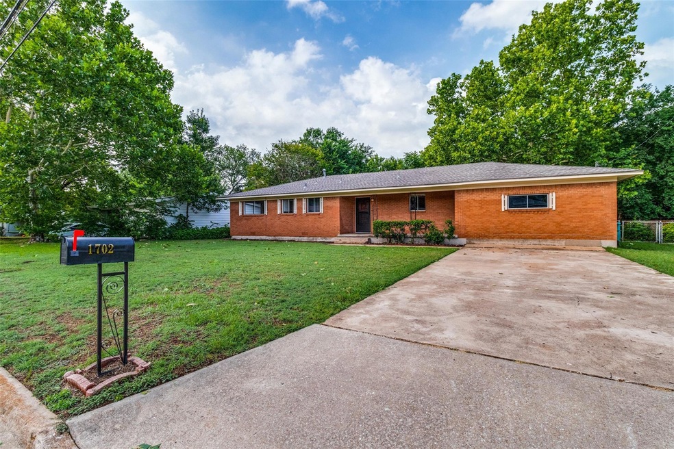 1702 E Mildred St, Sherman, TX 75090 - photo 1