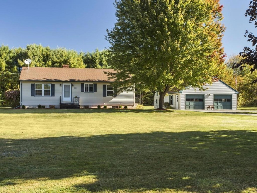 Spacious, well manicured lot sits...