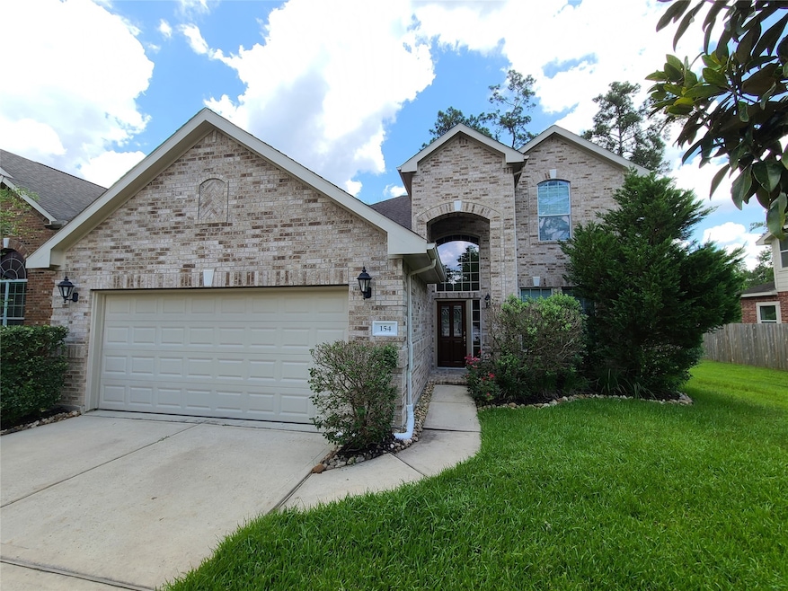 154 E Spindle Tree Cir, Spring, TX 77382 - photo 1