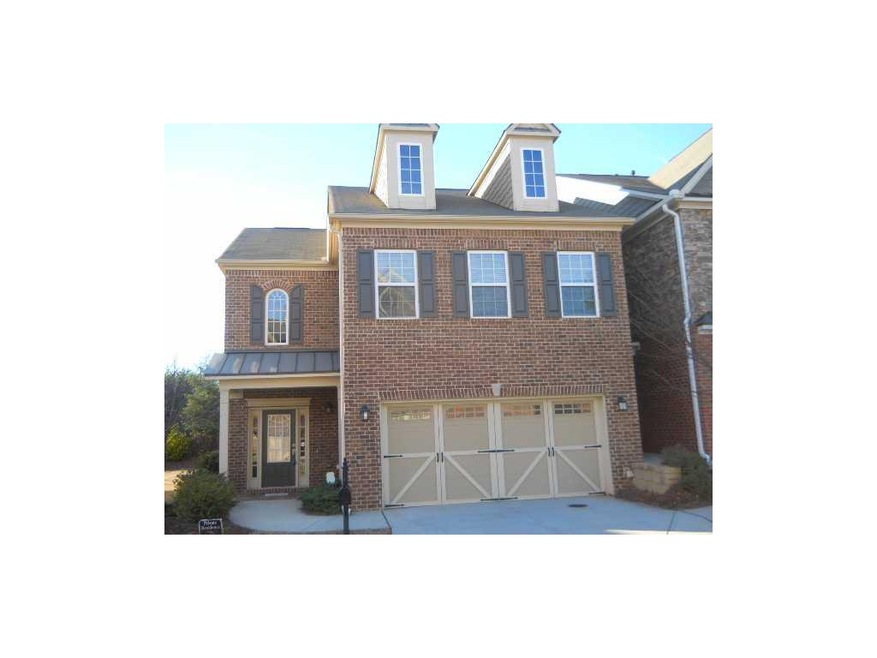 Exterior Front. gorgeous brick townhome in johns creek