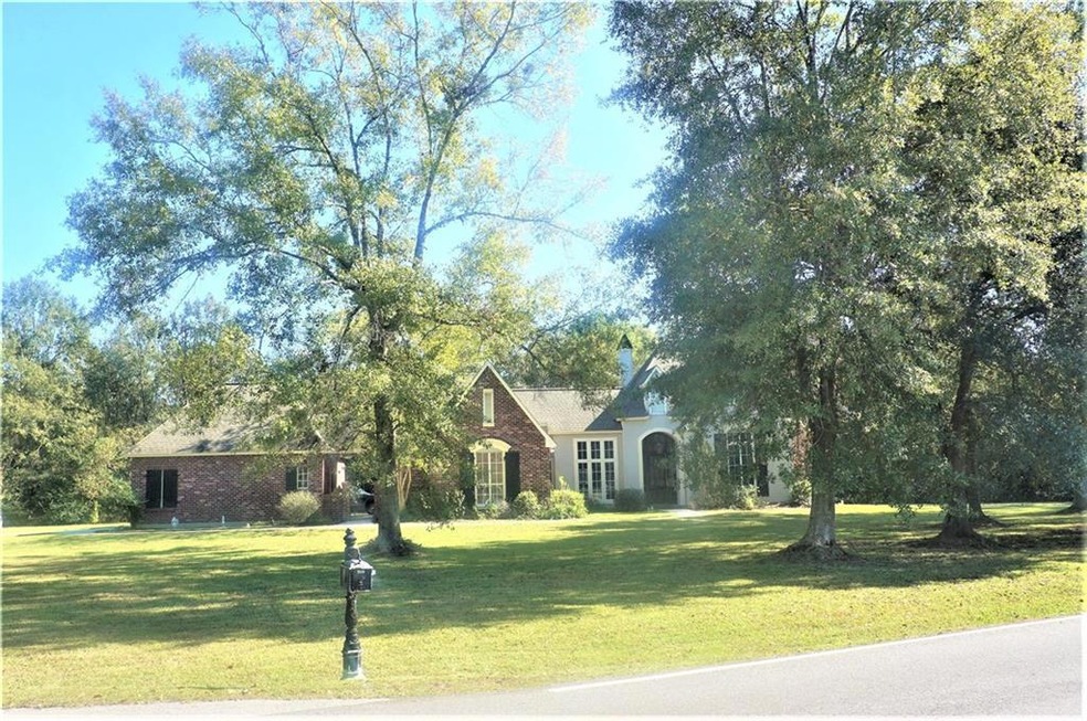 Beautiful Home and Shade Treed 1 Acre Lot.