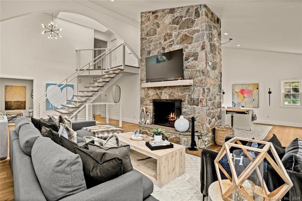 Open flow living space, double sided stone firepla
