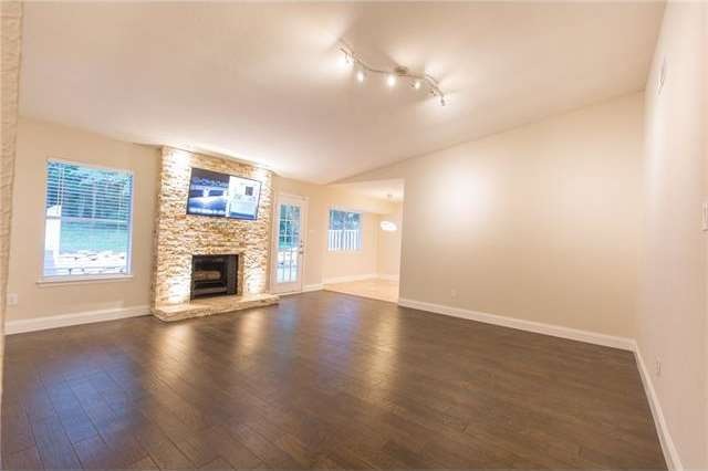 LV w/ Hand-scraped Hickory Hardwood and Travertine
