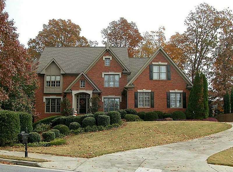 Exterior Front. 3 side brick beauty with incredibl
