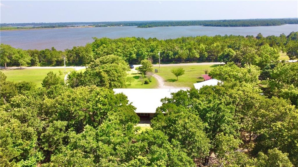 Home from the air with view of Shawnee Lake in fro